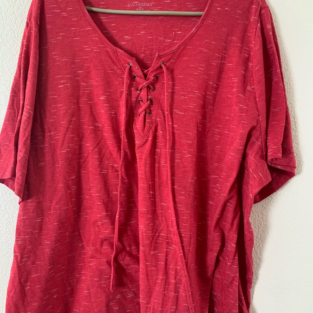 Longer red T-shirt.